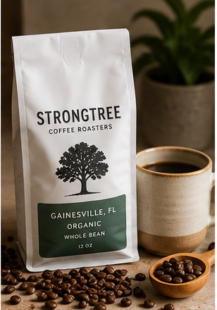 Branded coffee bag with whole beans and morning coffee setup from Strongtree Organic Coffee Roasters